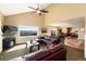 Open-concept living room with vaulted ceilings and natural light at 5549 Lake Gulch Rd, Castle Rock, CO 80104