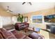 Comfortable living room featuring vaulted ceilings and scenic outdoor views at 5549 Lake Gulch Rd, Castle Rock, CO 80104