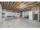 Spacious unfinished basement offers endless possibilities for customization and expansion with stairs to above at 3256 Offbeaten Pl, Castle Rock, CO 80108