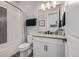 Cozy bathroom featuring a shower-tub combo with white subway tile and a dark gray accent stripe at 3256 Offbeaten Pl, Castle Rock, CO 80108