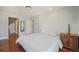 Bright bedroom features hardwood floors, neutral walls, and ample natural light at 113 Oakdale Dr, Palmer Lake, CO 80133