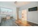 Open room features wood floors, recessed lighting, and a screen from a projector at 113 Oakdale Dr, Palmer Lake, CO 80133