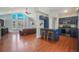 Open concept living area with modern kitchen and great natural light, scenic views at 113 Oakdale Dr, Palmer Lake, CO 80133