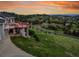 Elevated view of home with an outdoor deck overlooking a sprawling landscape at 260 Dekker Dr, Golden, CO 80401