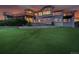 Expansive backyard with manicured lawn, patio, and beautiful exterior design at 260 Dekker Dr, Golden, CO 80401