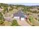 Stunning aerial view of estate with lush landscaping and attached multi-car garage at 260 Dekker Dr, Golden, CO 80401