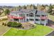 Stunning home has multiple decks, solar panels, an artificial lawn, and professionaly landscaped terrace at 260 Dekker Dr, Golden, CO 80401