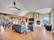 Expansive living room boasts a fireplace, ceiling fans, and an open layout with views of the dining area at 260 Dekker Dr, Golden, CO 80401