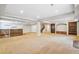 Spacious basement offering a bar area and lots of room for entertaining at 6085 Nile Cir, Golden, CO 80403