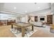 Finished basement features a pool table, bar area, and cozy seating area at 6085 Nile Cir, Golden, CO 80403