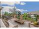 A furnished deck offers a relaxing outdoor living space with views of the surrounding greenery and neighborhood at 6085 Nile Cir, Golden, CO 80403