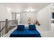 Upstairs bonus room with playroom featuring a basketball hoop and play furniture at 244 Chipeta Way, Lochbuie, CO 80603