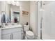 Clean, well-maintained bathroom featuring a glass-enclosed shower and modern fixtures at 11783 Niagara St, Thornton, CO 80233