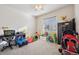Bright bedroom with ample natural light and neutral carpeting, ready to be personalized at 11783 Niagara St, Thornton, CO 80233