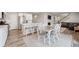 Open layout seamlessly combines the kitchen, dining, and living areas, perfect for modern living and entertaining at 11783 Niagara St, Thornton, CO 80233