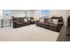 Upstairs living room offers dual seating options and lots of space for relaxation at 11783 Niagara St, Thornton, CO 80233