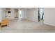 Spacious basement features carpeted floor, white walls, and a bench at 2695 S Josephine St, Denver, CO 80210