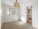 Cozy dining area featuring stylish light fixture and easy access to the kitchen at 2695 S Josephine St, Denver, CO 80210