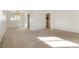 Large living room featuring neutral paint colors, carpet and a breakfast nook at 2695 S Josephine St, Denver, CO 80210