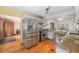 Open-concept kitchen flows into the dining area featuring granite countertops and stainless steel appliances at 268 Cedar Rd, Golden, CO 80401