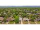 Aerial view of neighborhood showcasing lush greenery, and tree-lined streets at 3241 Sheridan Blvd, Wheat Ridge, CO 80212