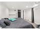 Bedroom featuring two beds, closet, and ceiling lights at 3241 Sheridan Blvd, Wheat Ridge, CO 80212