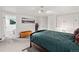 Bedroom featuring a dark wood bed frame, large closet, and ceiling lights at 3241 Sheridan Blvd, Wheat Ridge, CO 80212