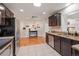Open kitchen featuring stainless steel appliances and seamless flow into the adjacent dining area at 3241 Sheridan Blvd, Wheat Ridge, CO 80212