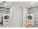 Efficient laundry room with washer, dryer hookups, and storage space for all your laundry needs at 3241 Sheridan Blvd, Wheat Ridge, CO 80212