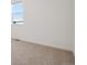 Neutral carpeted bedroom with a view from the window at 3226 Belleville Ridge Rd, Elizabeth, CO 80107