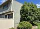 Suburban two-story home exterior with a mature tree in the front yard at 8643 Carr Loop, Westminster, CO 80005