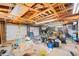 Spacious garage with exposed wood beams, plenty of storage, and a double door for easy access at 3131 S Washington St, Englewood, CO 80113