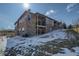 Exterior elevation with stone facade and private yard with walk out patio at 24963 E Phillips Pl, Aurora, CO 80016