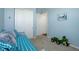 Cozy bedroom with daybed, ample storage and closet, and a calming color palette at 24963 E Phillips Pl, Aurora, CO 80016