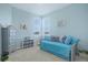 Bright bedroom with daybed, ample storage, and soothing color palette at 24963 E Phillips Pl, Aurora, CO 80016