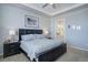 Relaxing main bedroom with en-suite bathroom, with king size bed and comfy decor at 24963 E Phillips Pl, Aurora, CO 80016