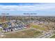 Aerial view of property near Waneka Lake Park and Hecla Lake, showcasing the desirable neighborhood location at 1585 Hecla Way # 304, Louisville, CO 80027