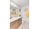 Modern bathroom with sleek vanity, and neutral tile at 1585 Hecla Way # 304, Louisville, CO 80027