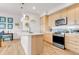 Modern kitchen with stainless steel appliances, quartz countertop, and plenty of cabinet space at 1585 Hecla Way # 304, Louisville, CO 80027