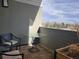 Cozy patio with seating, glass table, and partial view at 1585 Hecla Way # 304, Louisville, CO 80027