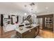 Open kitchen area with a large island, stainless steel appliances, and view into the living room at 410 Acoma St # Brownstone 3, Denver, CO 80204