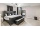 Well-lit main bedroom boasts large windows, a platform bed, and modern decor at 410 Acoma St # Brownstone 3, Denver, CO 80204