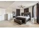 The main bedroom boasts modern design, with a platform bed and sleek furnishings at 410 Acoma St # Brownstone 3, Denver, CO 80204