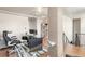Modern office space with a glass desk, stylish chair, and hardwood floors at 410 Acoma St # Brownstone 3, Denver, CO 80204