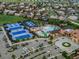 Aerial view of community amenities with tennis courts and pools at 27290 E Nova Cir, Aurora, CO 80016