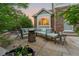 Back patio boasts a fire pit and ample seating, perfect for outdoor entertaining at 27290 E Nova Cir, Aurora, CO 80016