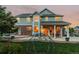 Large backyard with patio, climbing gym, and well-maintained lawn offers a great outdoor space at 27290 E Nova Cir, Aurora, CO 80016