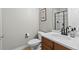 Charming bathroom featuring a modern vanity with a marble countertop and a glass-enclosed shower at 27290 E Nova Cir, Aurora, CO 80016