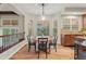 Cozy dining area features hardwood floors, natural light from windows, and an open floorplan at 27290 E Nova Cir, Aurora, CO 80016