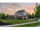 Beautiful two-story home with a well-manicured lawn, fenced backyard, and a three-car garage at 27290 E Nova Cir, Aurora, CO 80016